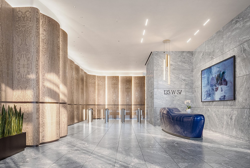 A luxe office building lobby with unique wood paneling and marble