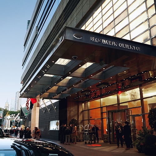 Sidewalk view of the Mandarin Oriental luxury hotel in NYC